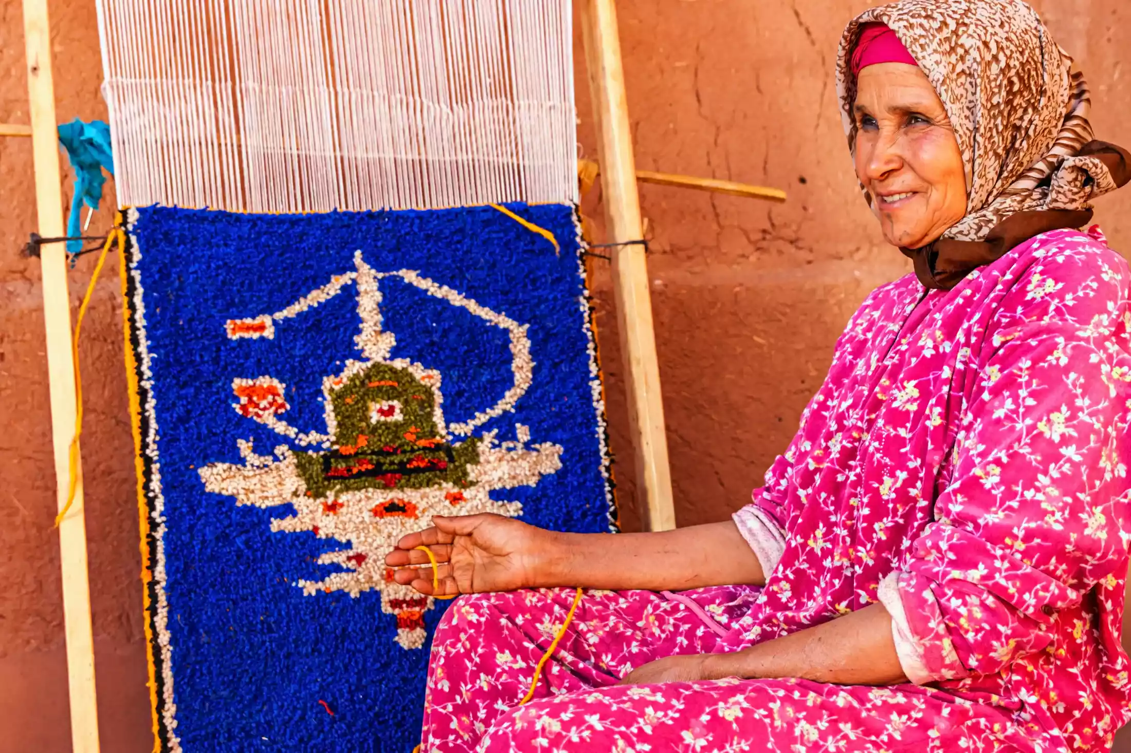 Berber woman weaving textiles.